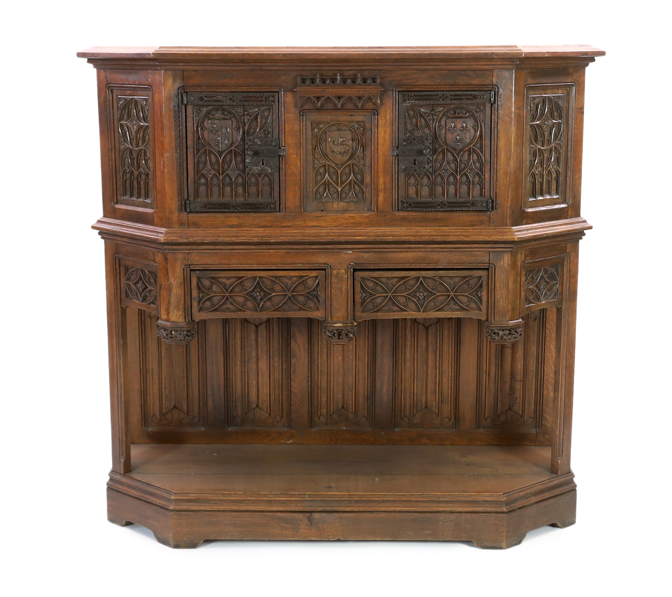 An antique oak dresser, based on a 15th century French gothic model and very similar to an example in the Wallace Collection